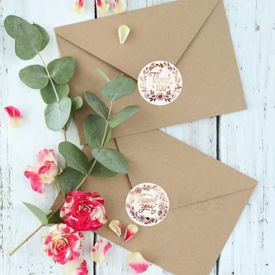 O empacotamento impermeável da etiqueta da etiqueta do casamento da flor agradece-lhe as etiquetas 500pcs do círculo